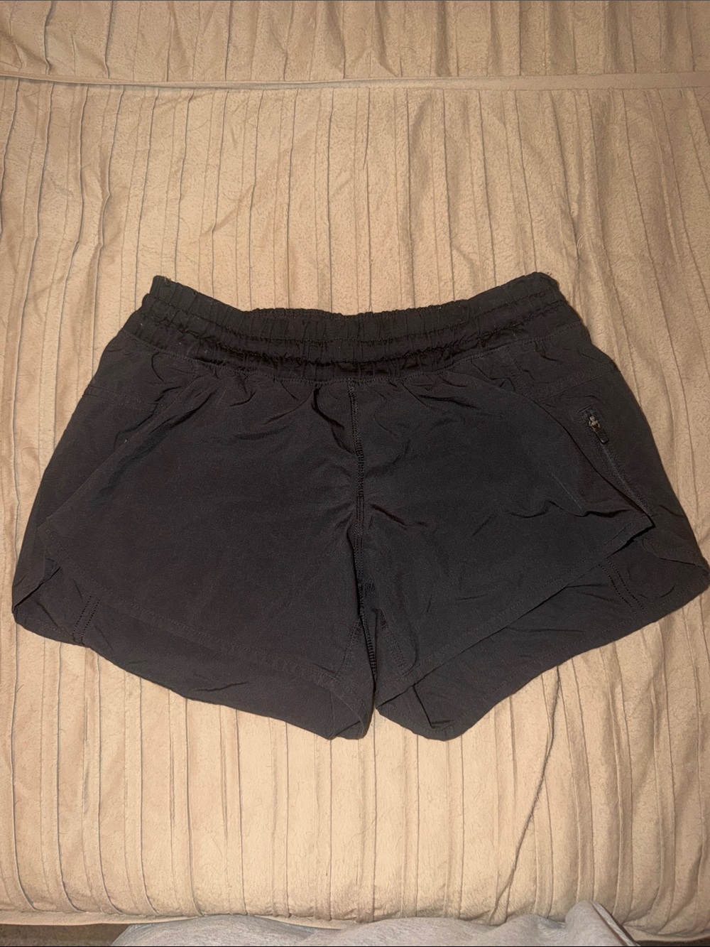 Lululemon Women's Black Athletic Shorts with Elastic Waist and Zipper Pocket